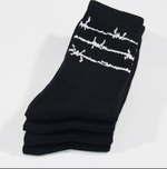 barbed wire socks - Vignette | OFF-WRLD